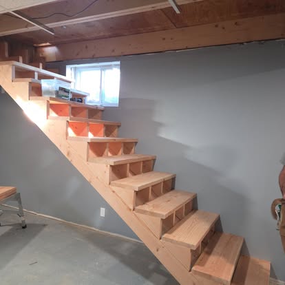 Custom basement staircase framing and carpentry