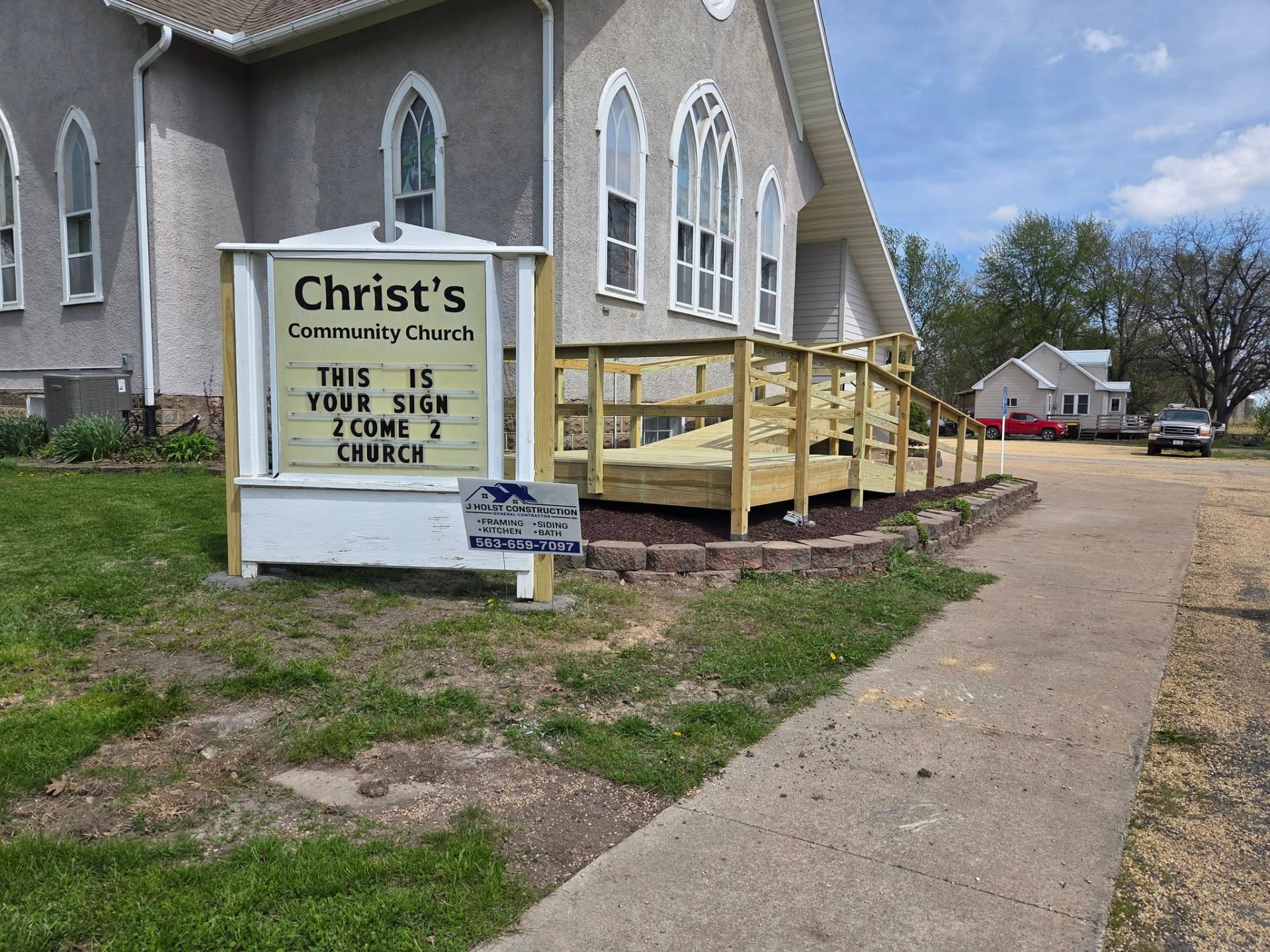 Custom wheelchair ramp with church sign